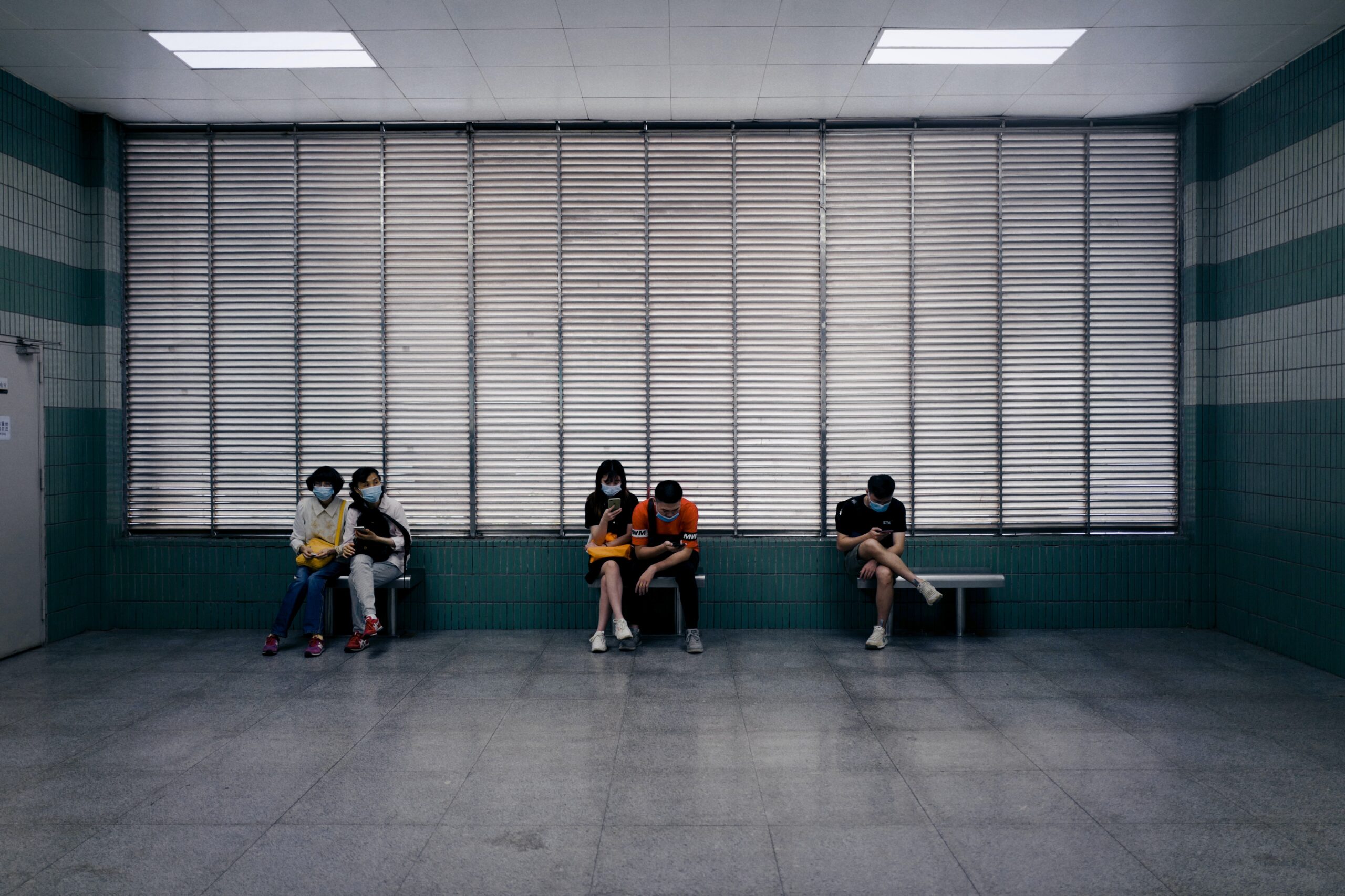 People sitting in a big hall