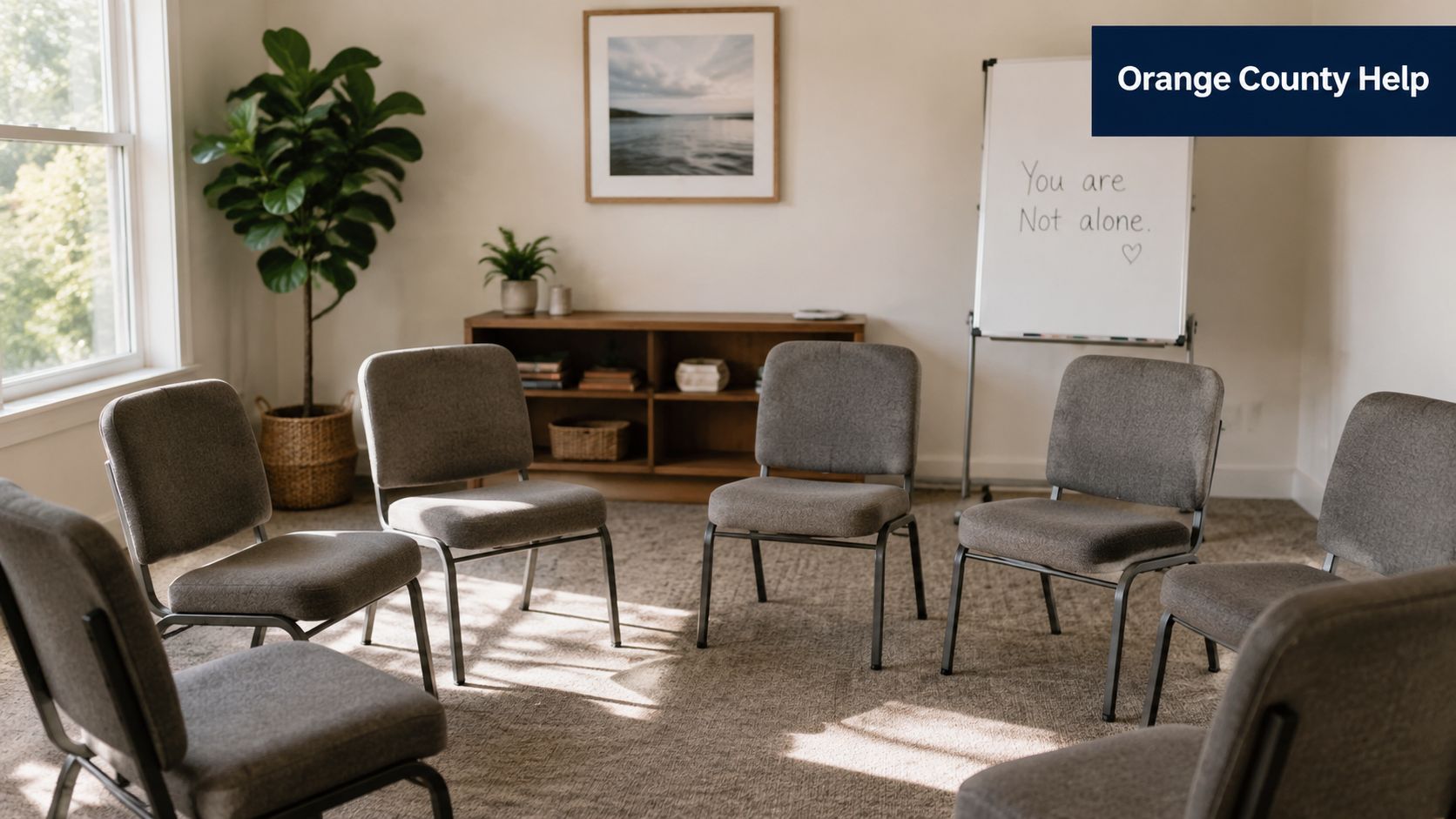 A quiet group therapy room set up with chairs in a circle for support group meetings.