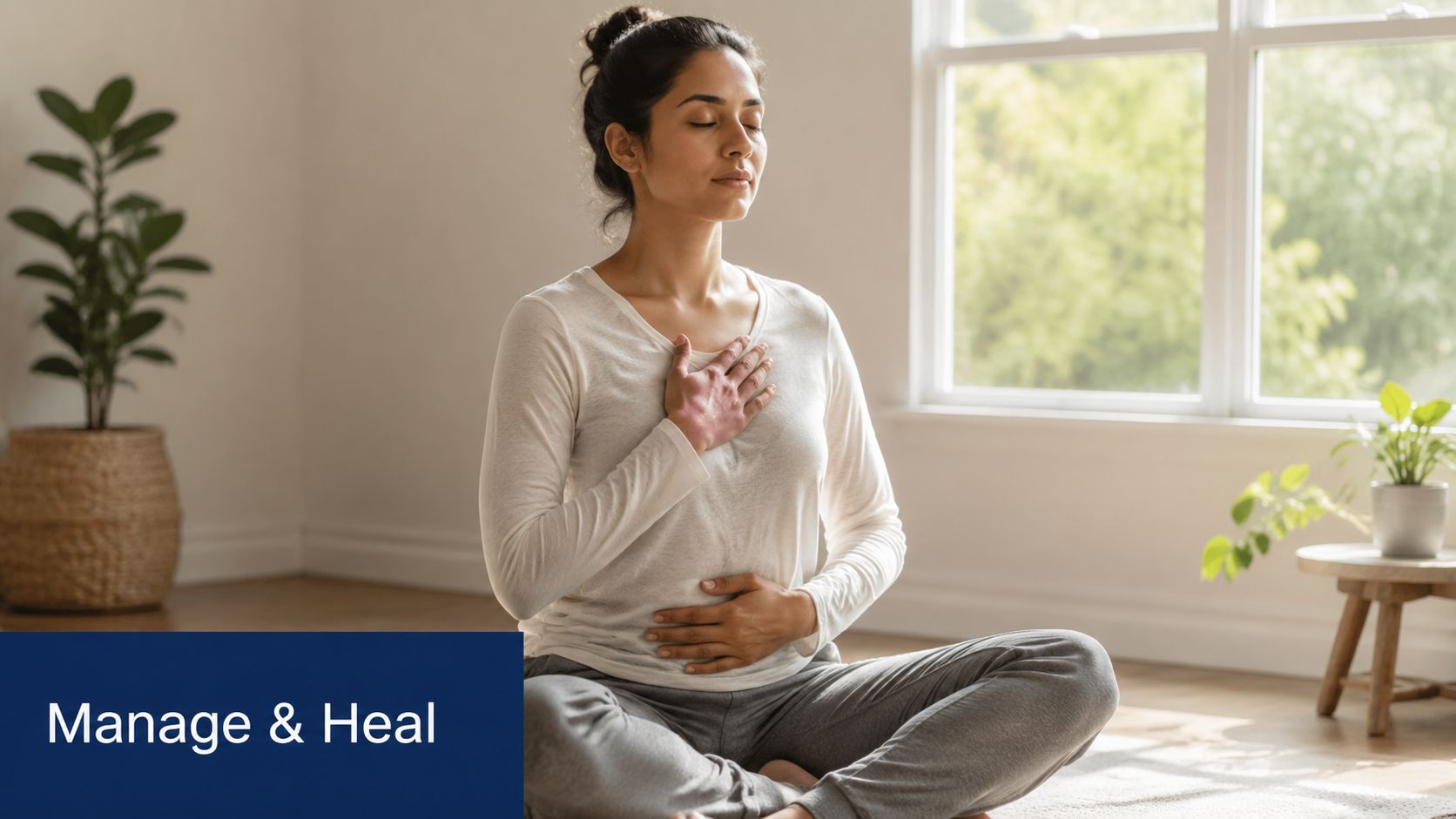 A woman practicing mindful breathing with hands on her chest and abdomen to manage stress and heal.
